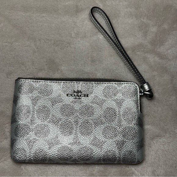 Coach Handbags - COACH Metallic Wristlet monogram silver